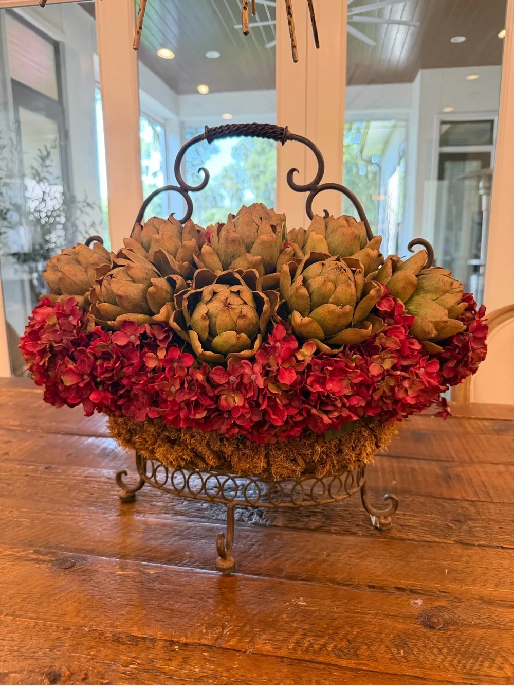Rustic Iron Basket Centerpiece with Green Artichoke and Red Hydrangea Accents
